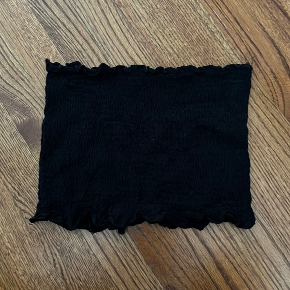 Brand is Cotton Candy LA, black ribbed tube top, size S/M